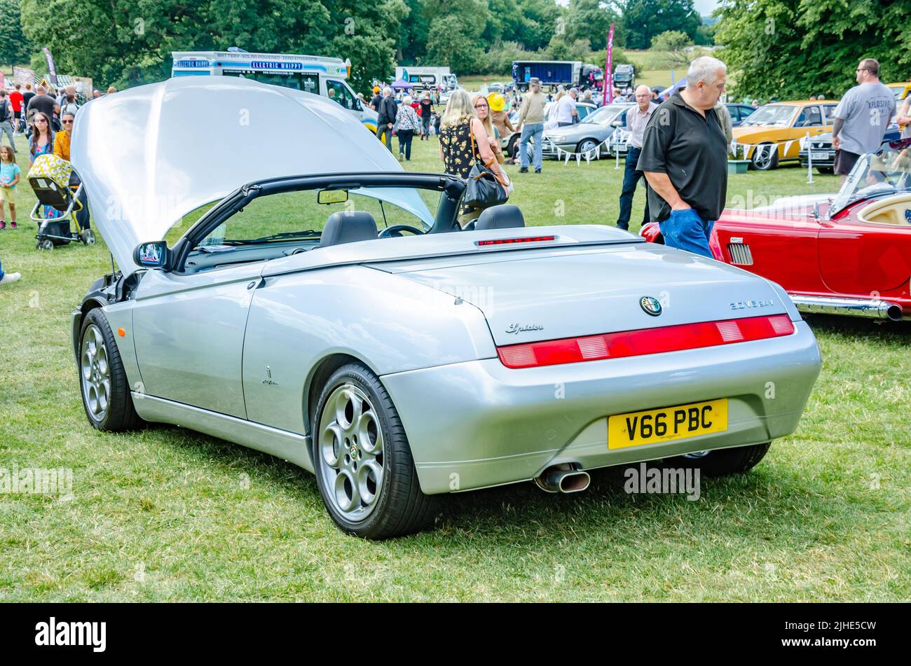 Rear view of a 1999 Alfa Romeo Spider sports car in silver at The Berkshire Motor Show in Reading, UK Stock Photo