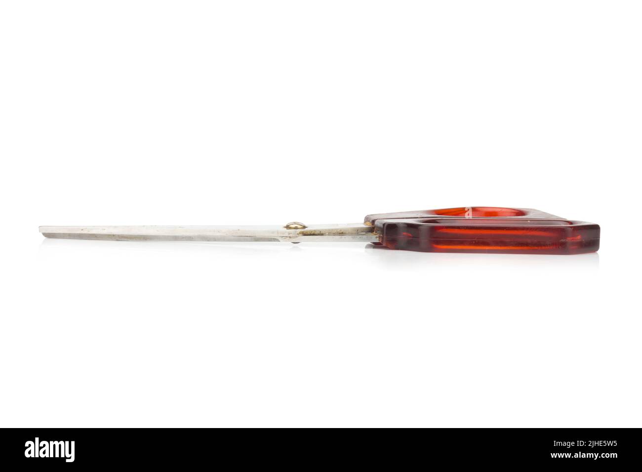 red scissors. dirty. isolated no white background. Stock Photo