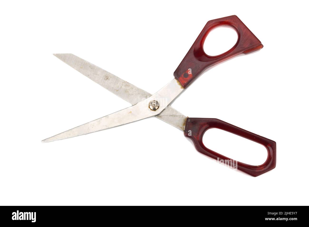 red scissors. dirty. isolated no white background. Stock Photo