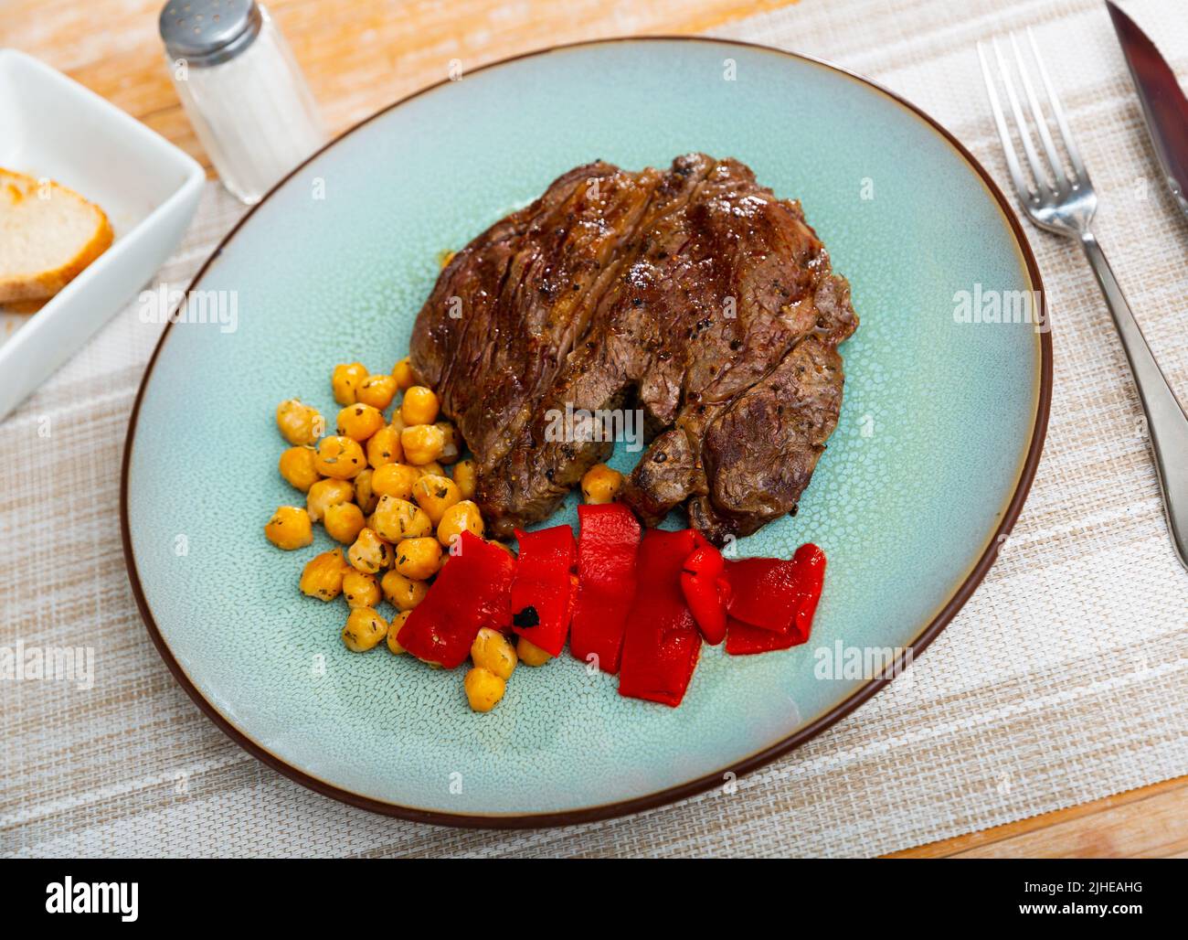 Popular dish of beef with chickpeas Stock Photo - Alamy