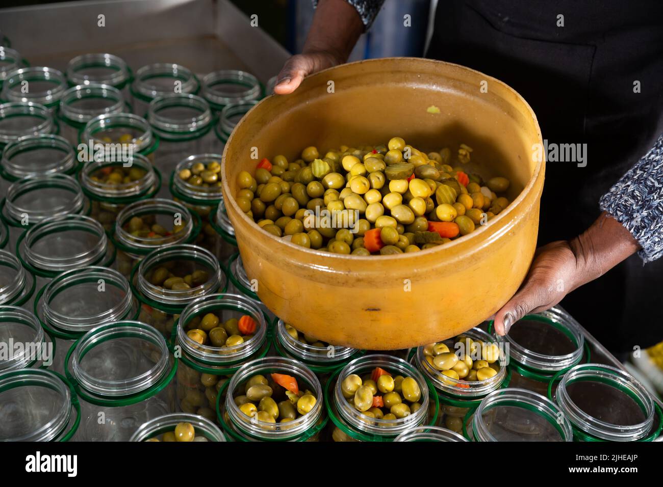 Preparing for pickling olives at food factory Stock Photo Alamy