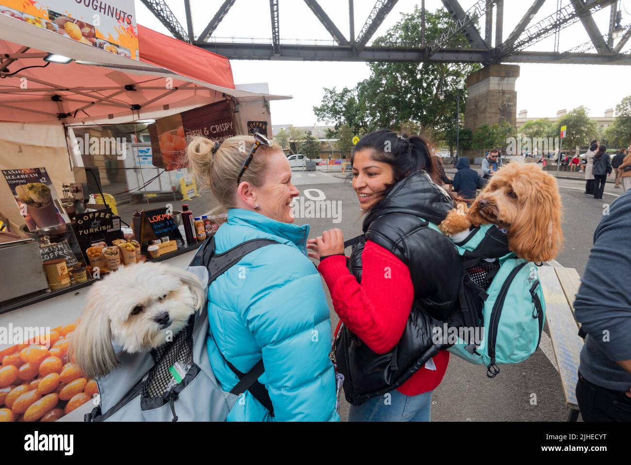 July 16, 2022: Garima and Cindy from the Hills Shire in Sydney brought their best friend with them to the Christmas in July, Rocks Markets in Sydney Stock Photo