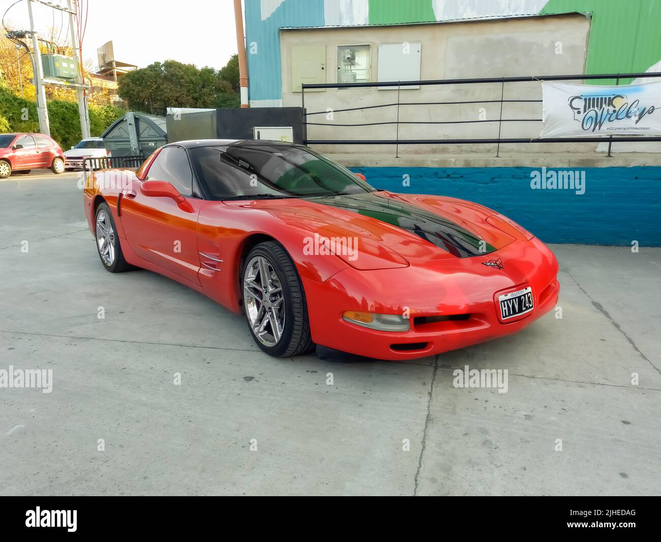 Old red and black sport Chevrolet Corvette C5 coupe two door 1997 - 2004 by GM. Classic racing muscle car. Expo Fierro 2022. Copyspace Stock Photo