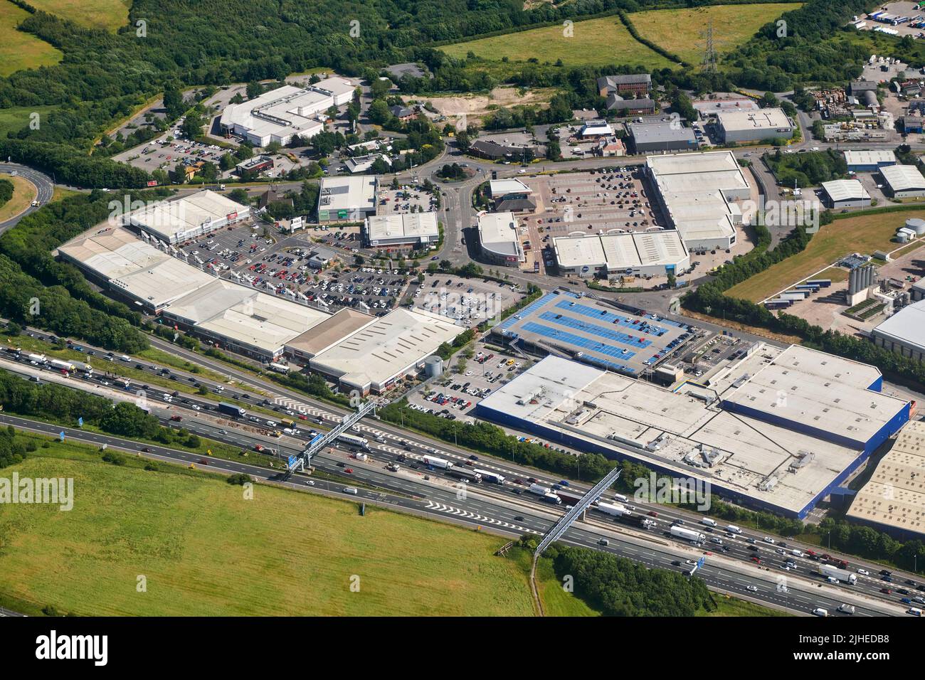 an aerial photograph of Junction 27 retail park, adjacent to the M62, Birstall, West Yorkshire, Northern England, UK Stock Photo