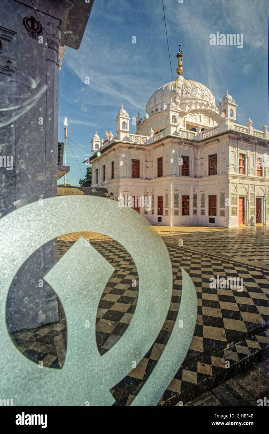 22 Dec 2010 Khanda (Sikh symbol) Shot thru Glass Panel Gurudwara Nanak