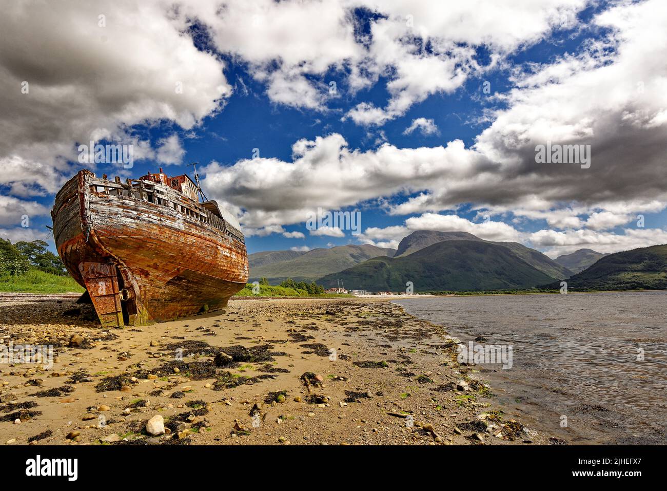 OLD BOAT OF CAOL FORT WILLIAM SCOTLAND BOAT ON CAOL SANDY BEACH BEN
