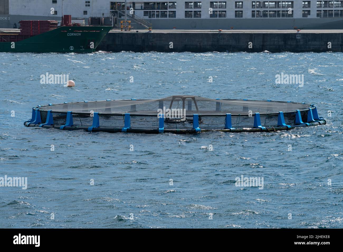 The aquatic fish cage system in the sea -fishing scene Stock Photo - Alamy