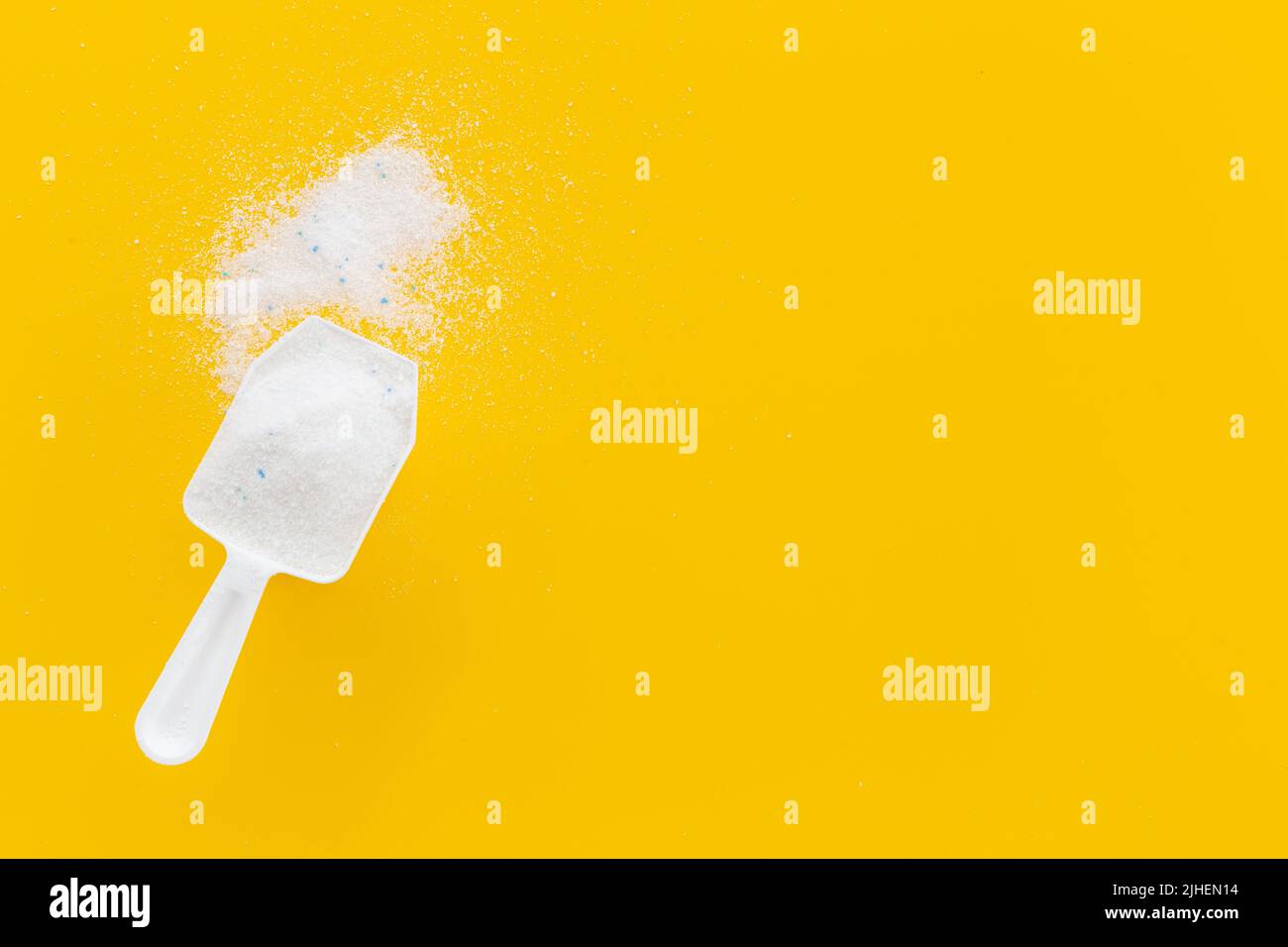 Laundry detergents powder with scoop for washing machine Stock Photo