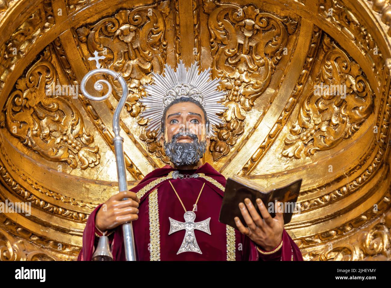 Trigueros, Huelva, Spain - April 17, 2022: Detail of head of Sculpture of San Antonio Abad (Saint Anthony Abbot),saint of trigueros, in its golden cha Stock Photo