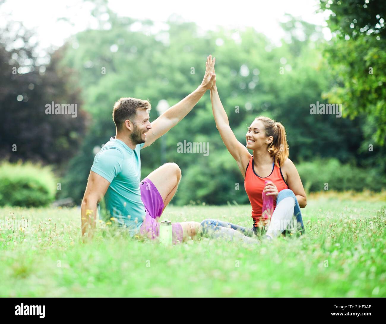 fitness woman park exercise lifestyle outdoor sport healthy couple