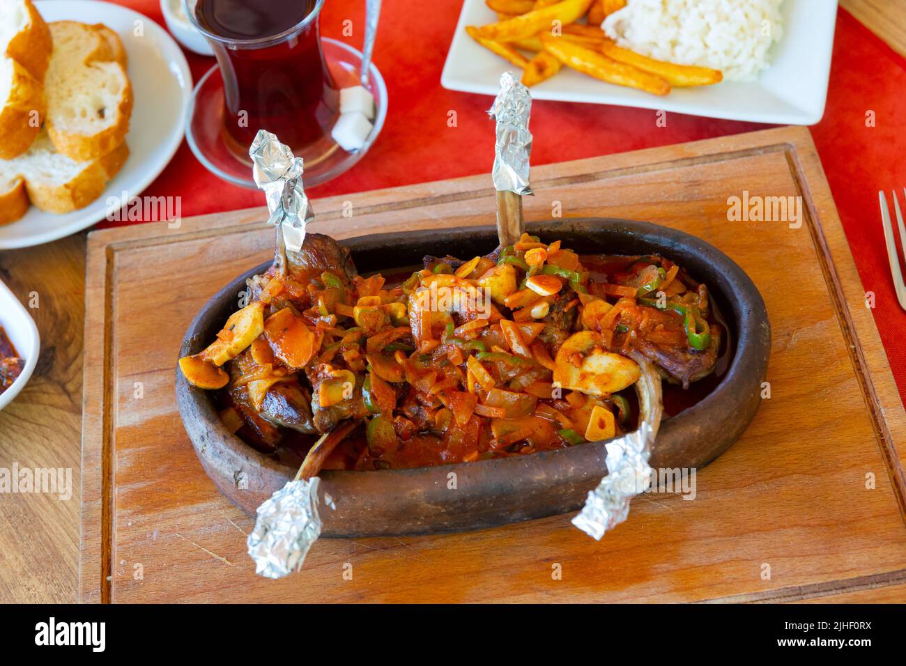 Turkish lamb chop casserole served on table Stock Photo - Alamy