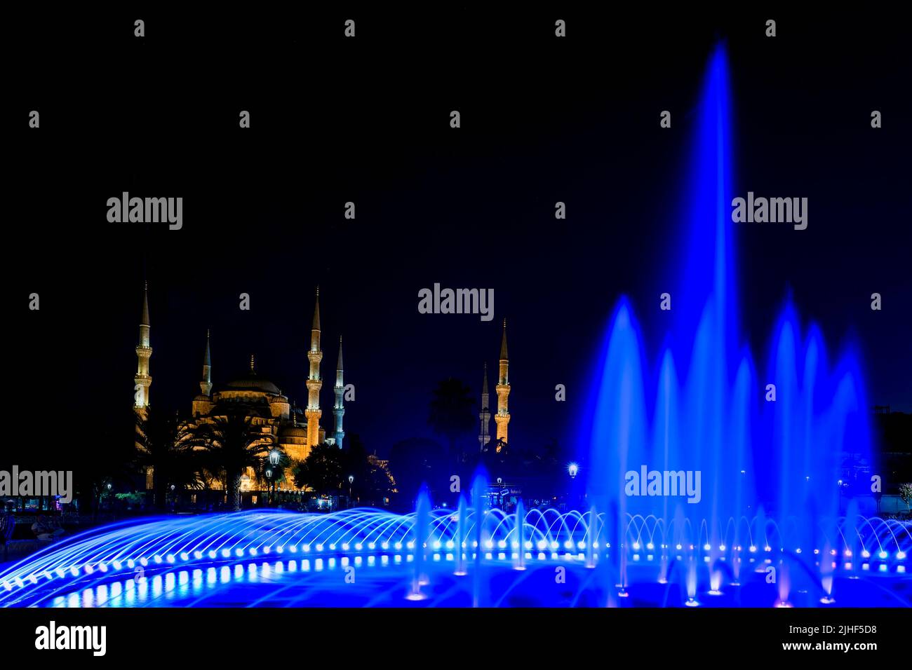 The Blue Mosque as seen from the Sultan Ahmed Park during nighttime in ...