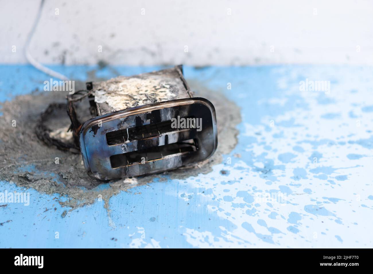 Toaster after fire. Household electrical appliance fire hazard