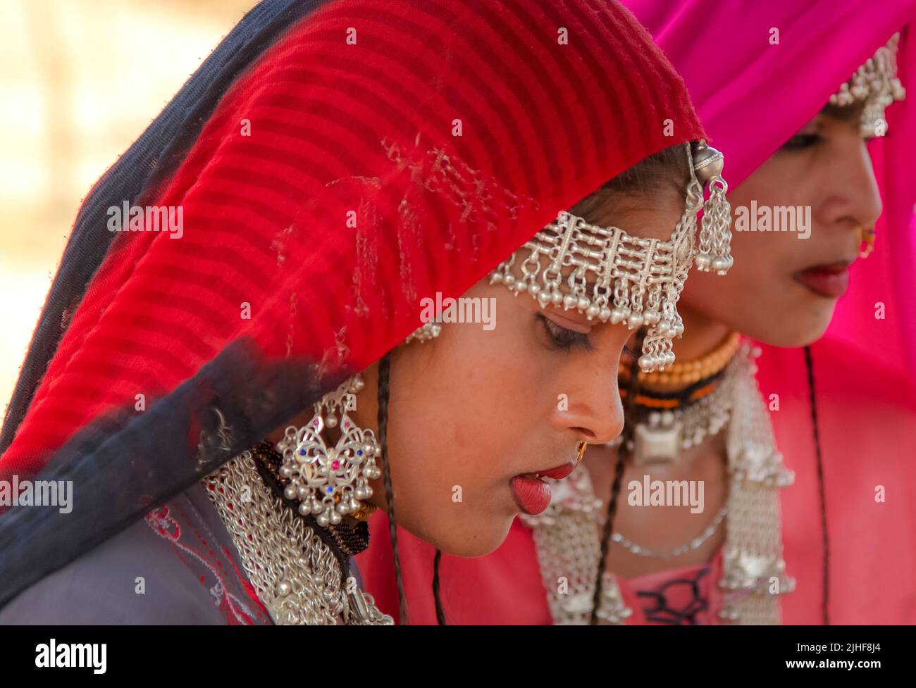 women in clourful dress in cholistan, traditional dress of women in rohi desert, rural people with traditional dress in punjab Stock Photo