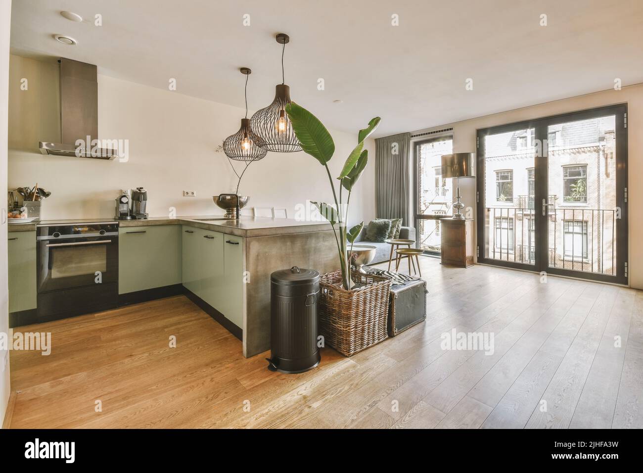 Interior of spacious light dining room and elegant chandelier located