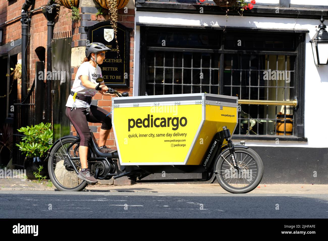 Pedicargo operate a fleet of cargo bikes around Hereford UK for local business deliveries and recycling waste collection Stock Photo