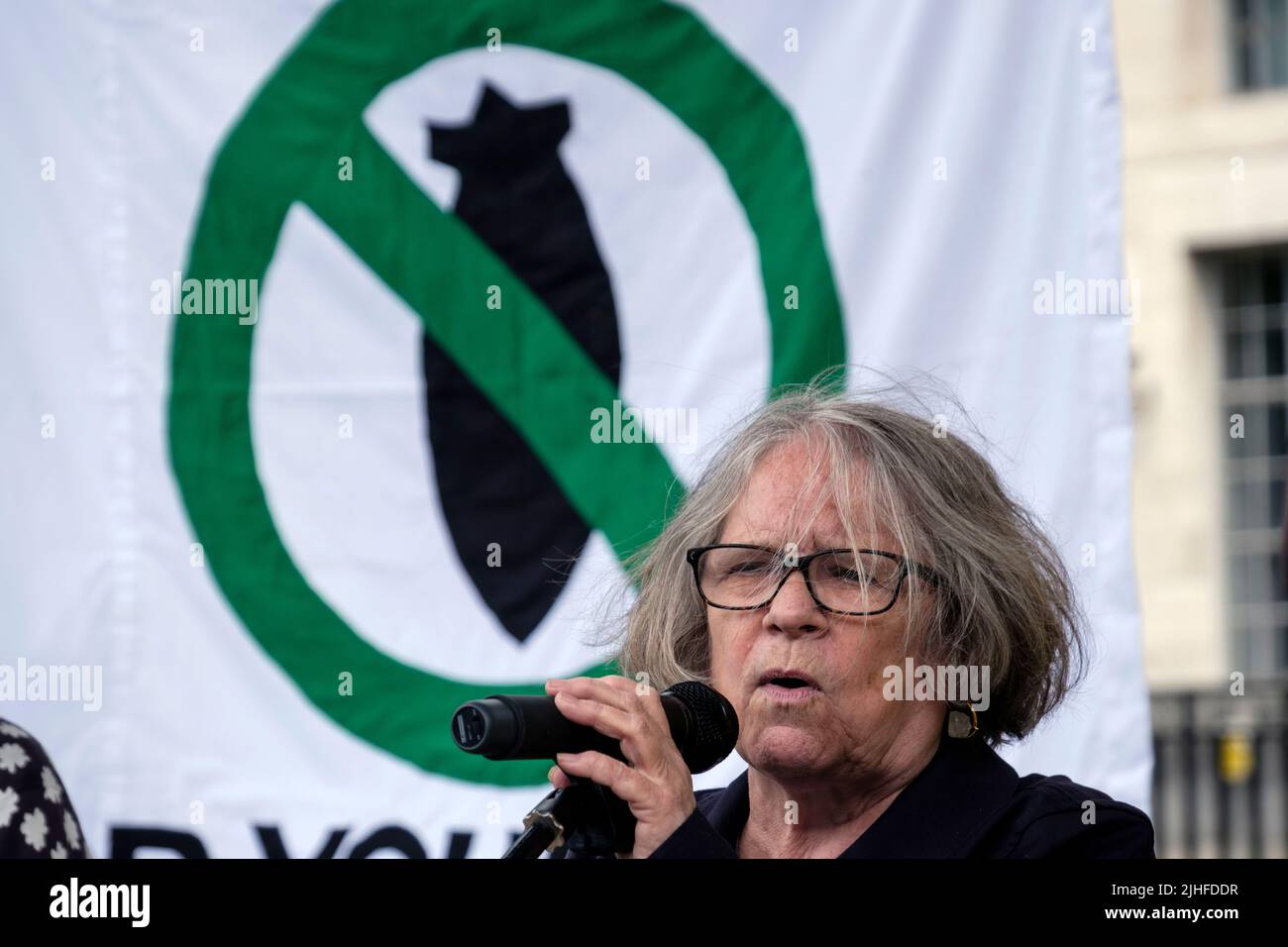 Lindsey German, founder of Stop the War speaking at protest by CND and Stop the War in Whitehall protesting against NATO and its policy towards Ukrain 2022. London 2022 Stock Photo