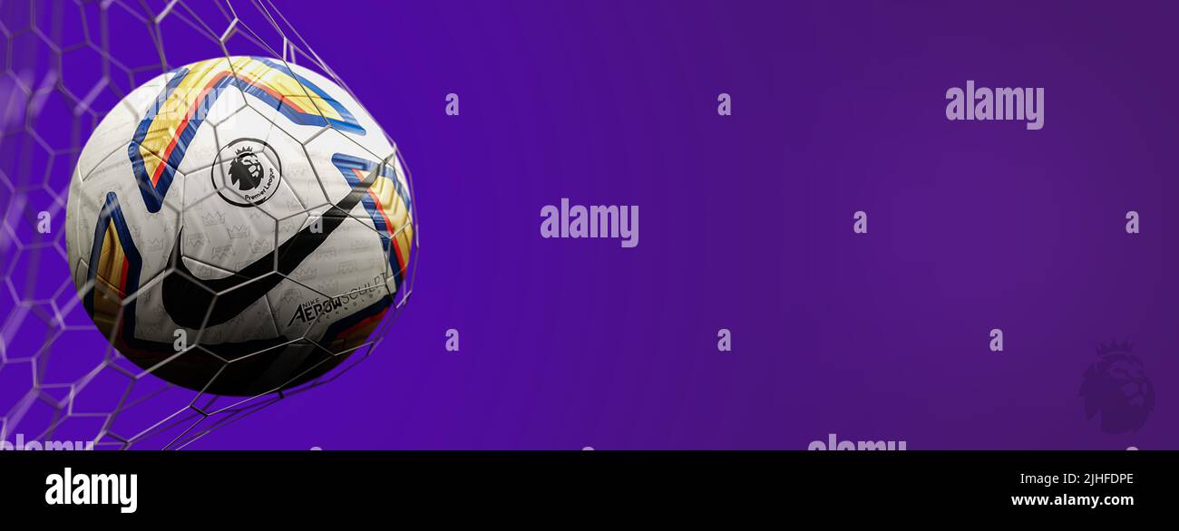 Guilherand-Granges, France - July 18, 2022. Premier League of England. Soccer ball in net with official logo of the Premier League. 3D rendering. Stock Photo