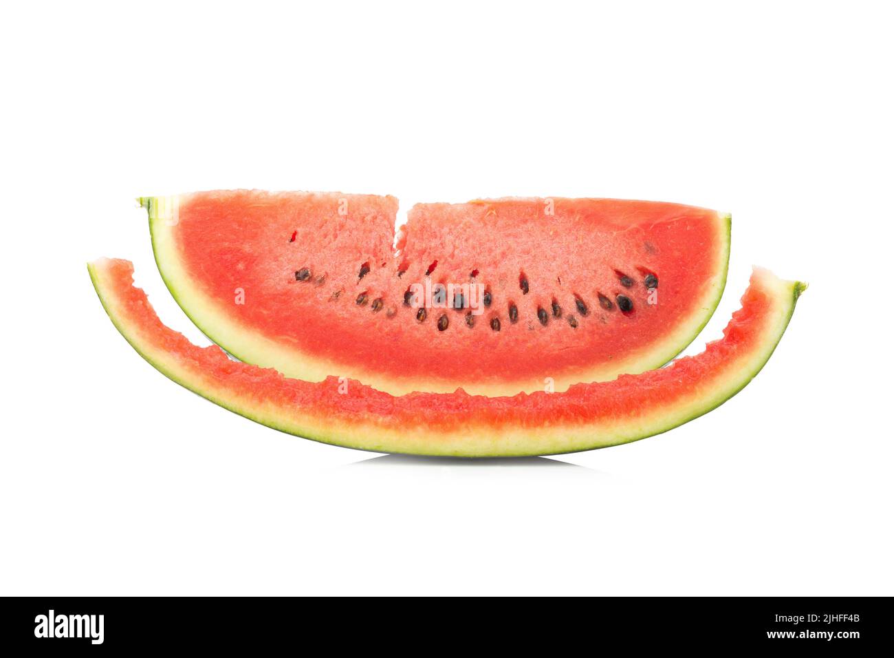 Watermelon slice eaten, isolated on white background. Stock Photo