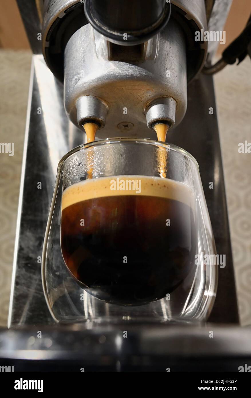 Wide Angle of Espresso Machine and Espresso cup with Foam Stock Photo