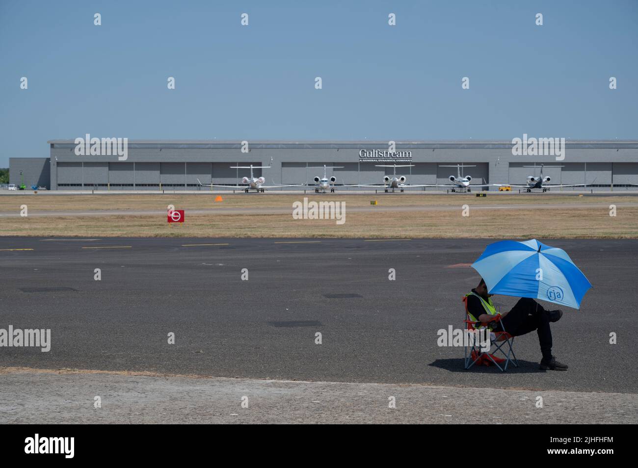 Farnborough, Hampshire, UK. 18 July 2022. The 2022 Farnborough International Trade Airshow opens at the height of the heatwave currently gripping the south of the UK with temperatures due to hit 40 degrees. Credit: Malcolm Park/Alamy Live News Stock Photo