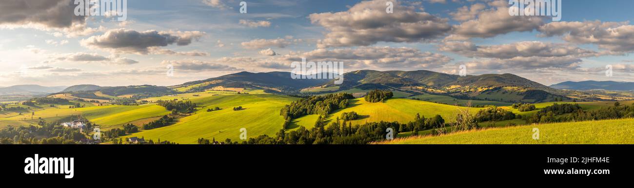 Panorama landscape with Snieznik Mountains and Kralicky Sneznik mountain between the Czech Republic and Poland Stock Photo