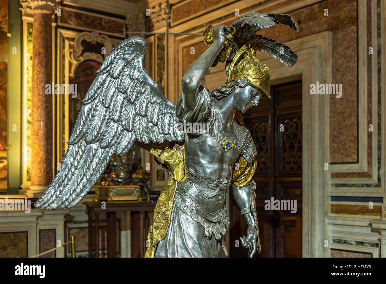 Metal statue of warrior angel inside catholic church in Naples-Italy Stock Photo