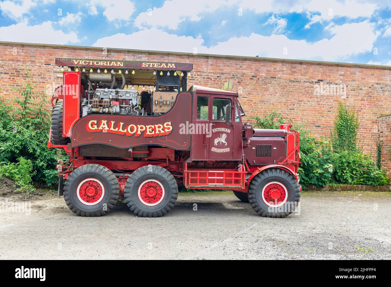 Vintage Scammell Explorer truck housing a generator for the Victorian steam gallopers fairground ride in Tatton Park near Knutsford, UK. Stock Photo