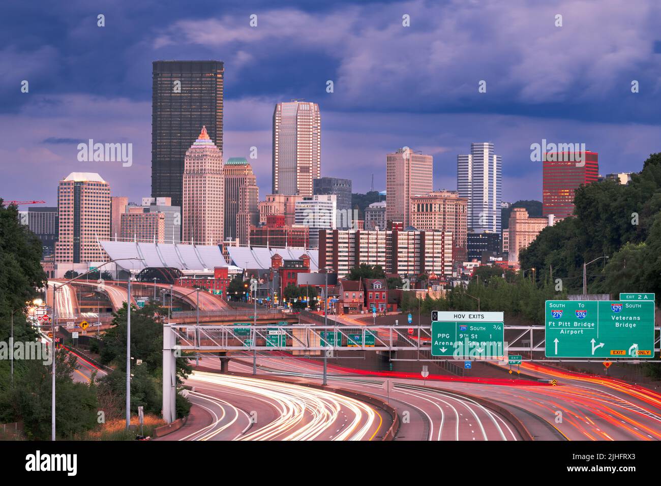 Pittsburgh, Pennsylvania, USA downtown city skyline over looking highways at dusk. Stock Photo