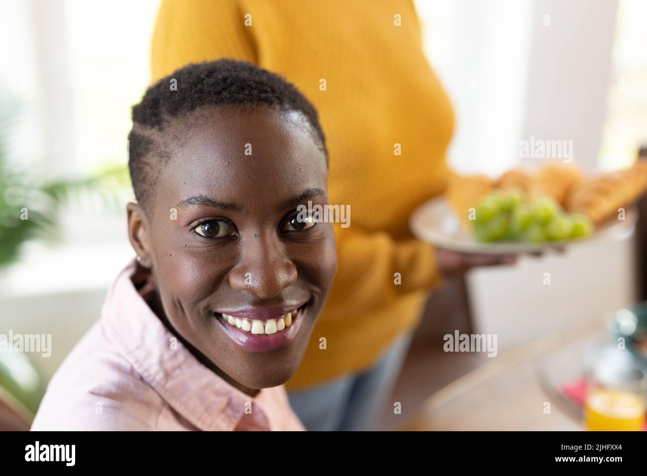Image cheerful african woman hi-res stock photography and images - Alamy