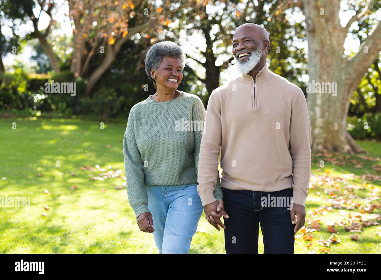Image of happy african american senior couple in garden Stock Photo - Alamy