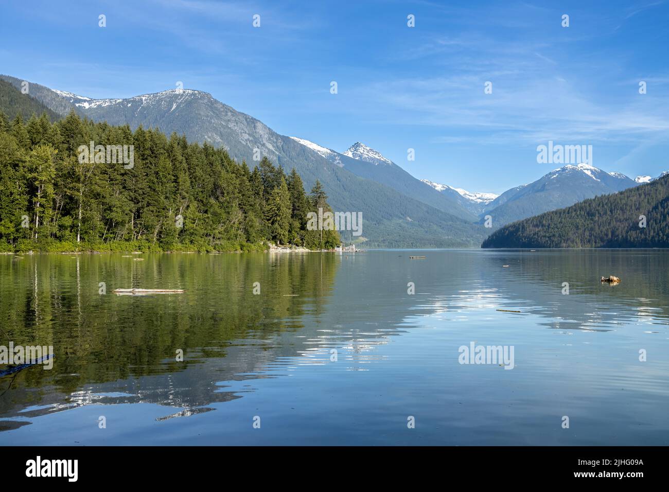 View of Lillooet Lake with mountains in the background taken from Strawberry Point Campground near Pemberton Stock Photo