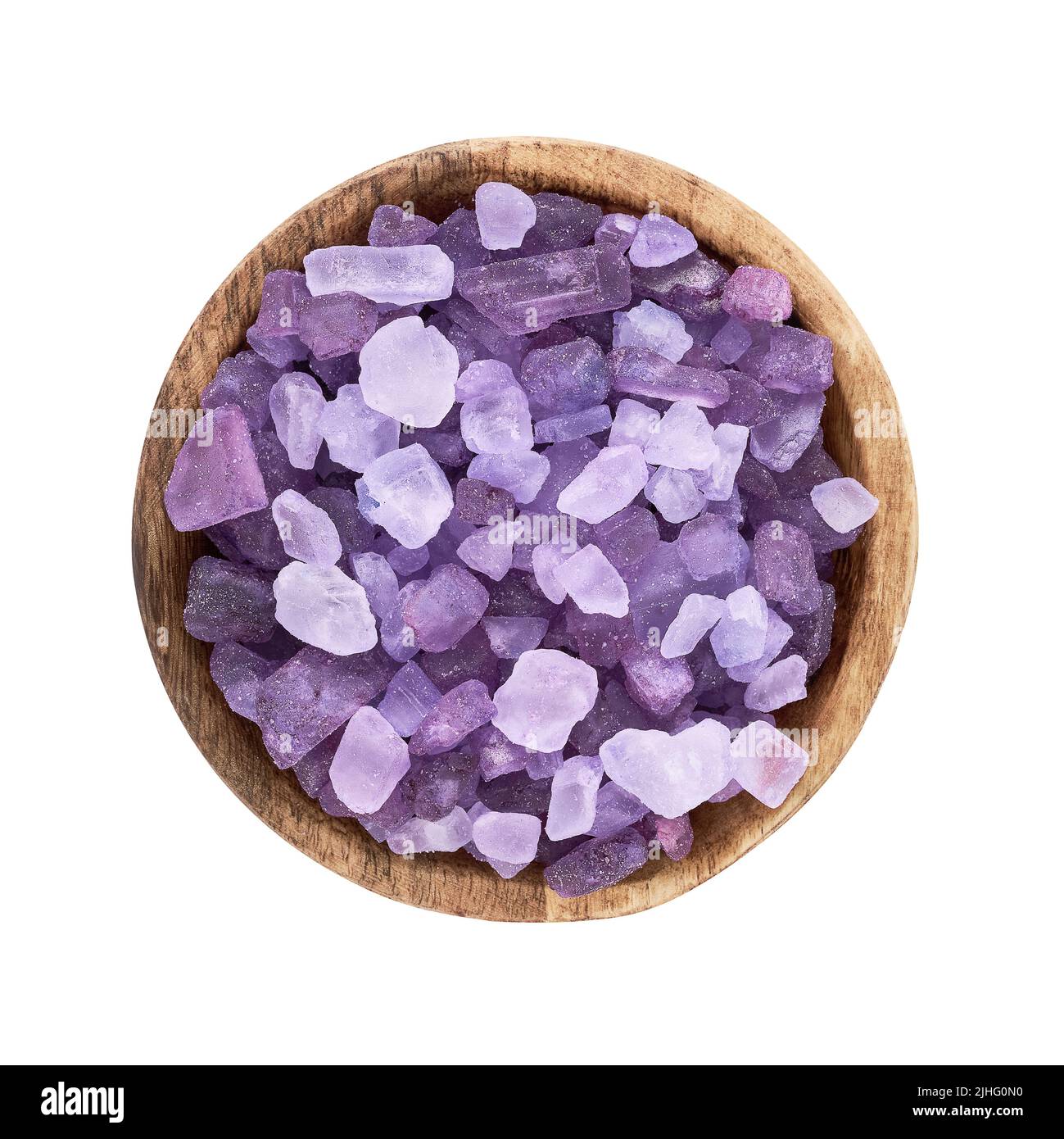 Lavender bath salt in wooden bowl isolated with clipping path over white background. Top view Stock Photo