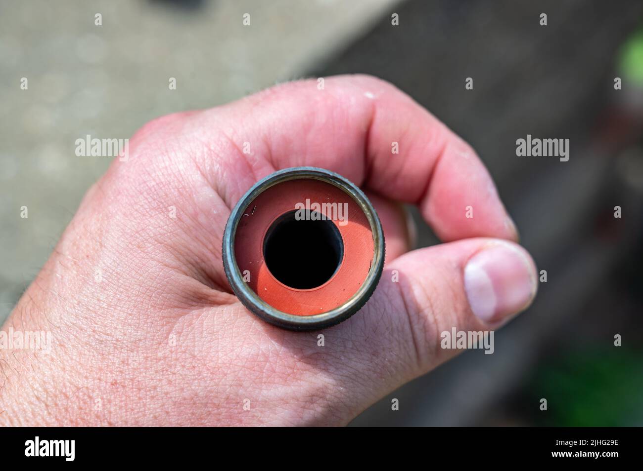 New rubber gasket being replaced in a garden hose female connection to