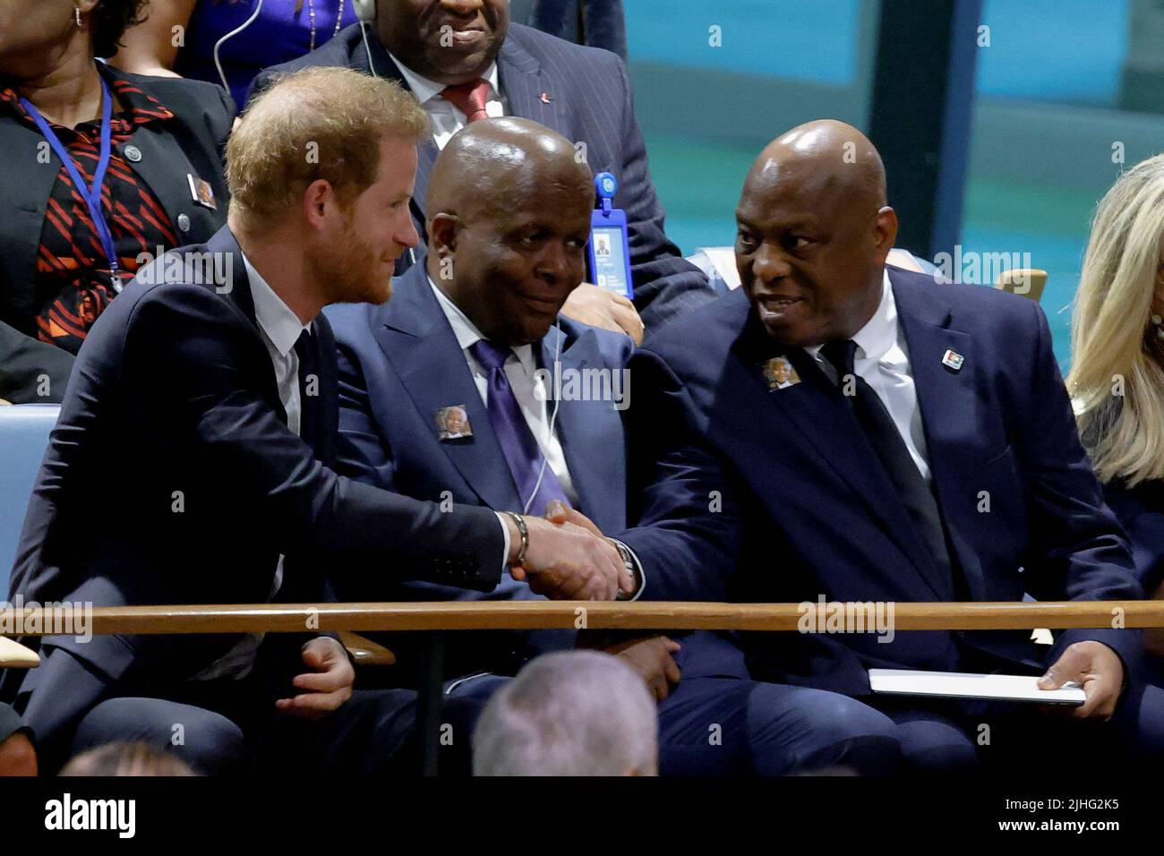 Britain's Prince Harry and Guinean Foreign Minister Morissanda Kouyate shake hands at the United Nations General Assembly celebration of Nelson Mandela International Day at United Nations Headquarters in New York, U.S., July 18, 2022. REUTERS/Eduardo Munoz Stock Photo