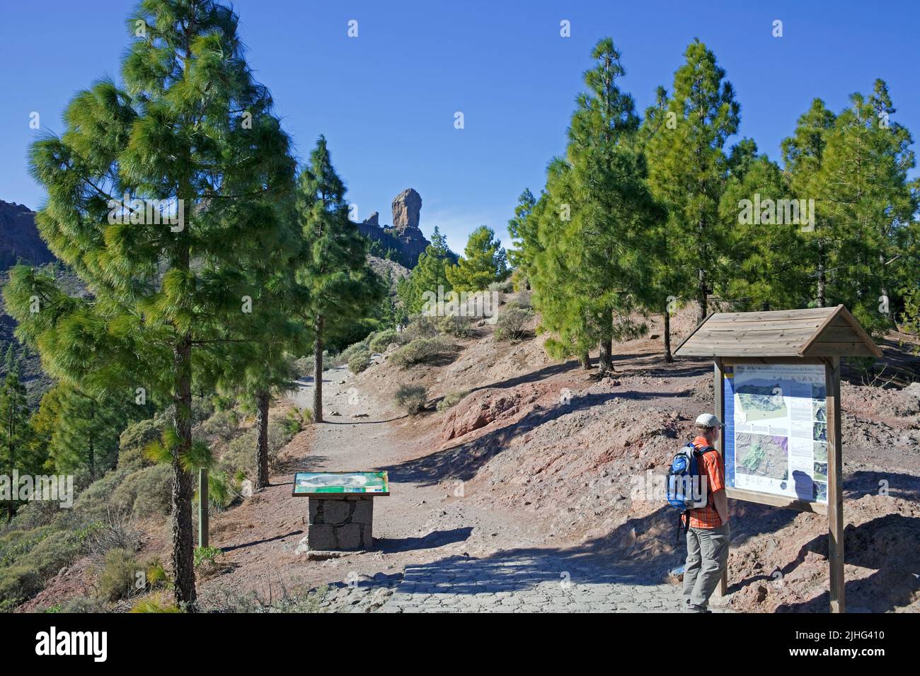 Hiker at the Roque Nublo, Tejeda, Grand Canary, Canary islands, Spain, Europe Stock Photo
