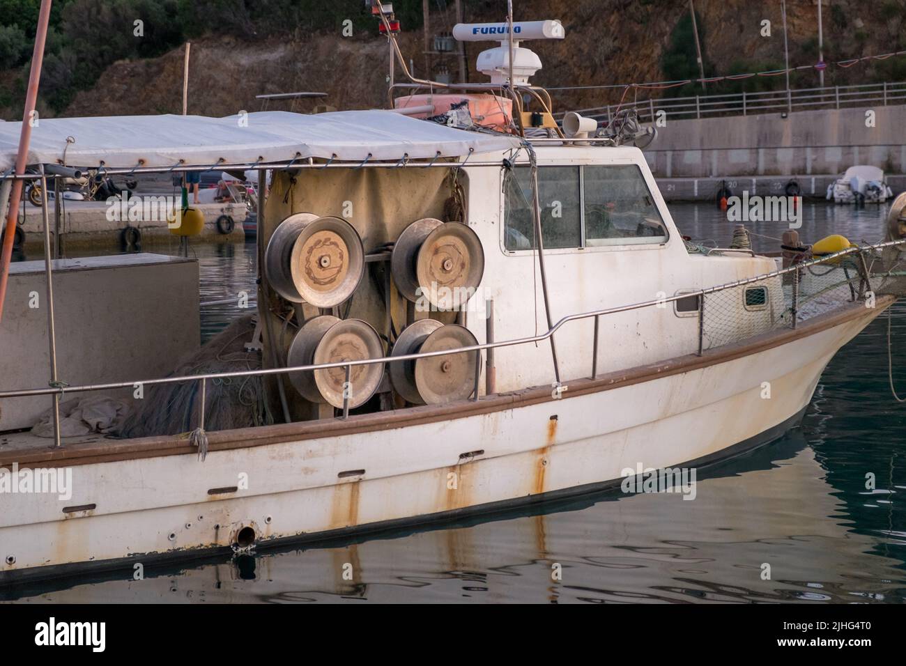 Fishing boat on a harbor Stock Photo