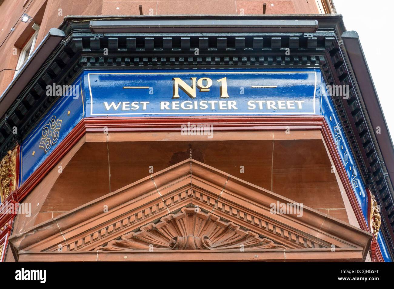 No.1 West Register Street sign painted on the side of a building in the city centre of Edinburgh, Scotland Stock Photo