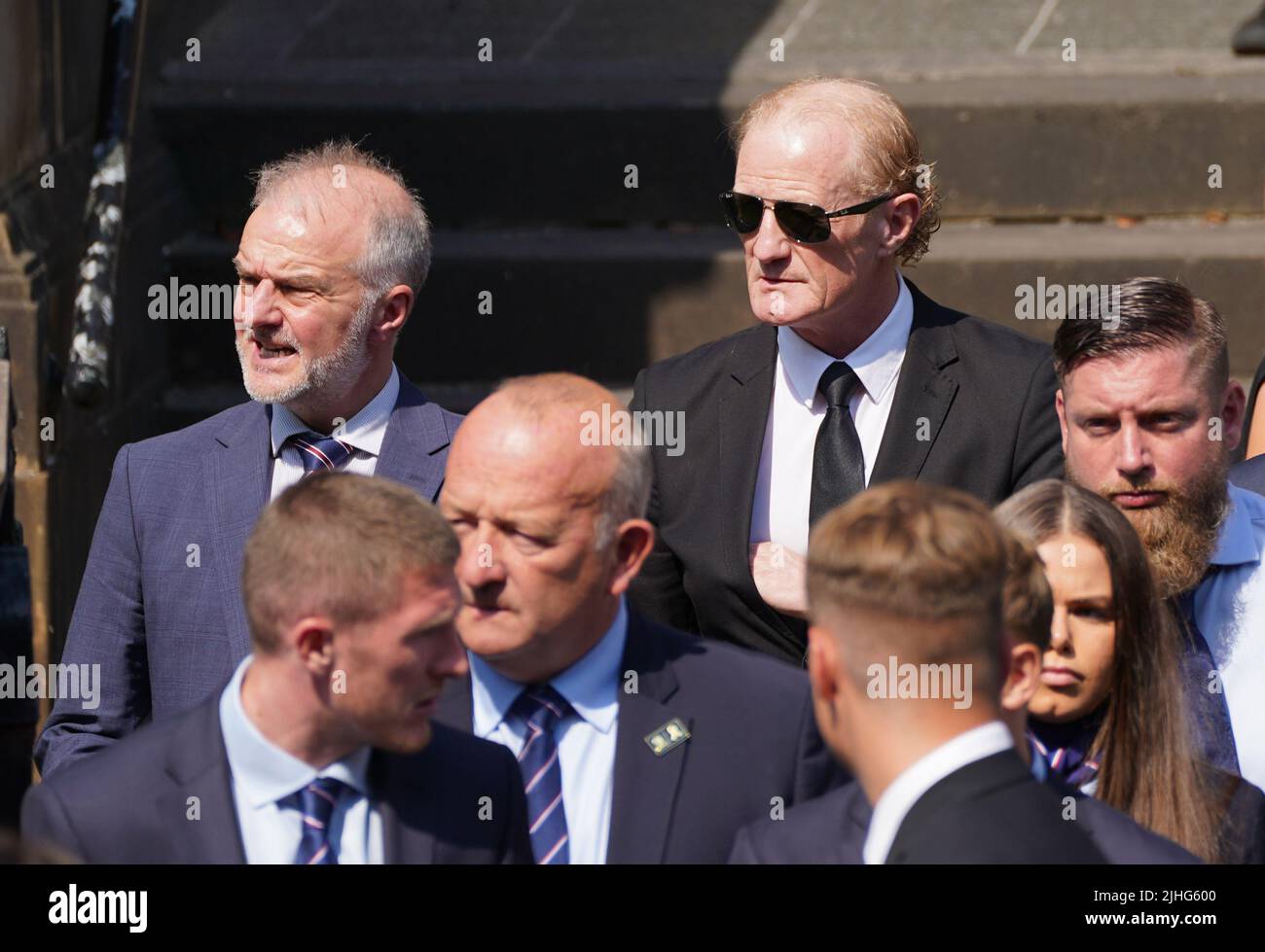 Former Rangers players Fraser Wishart (left) and Colin Hendry leave the church after of the funeral service of former Rangers goalkeeper Andy Goram, held at the Wellington Church, Glasgow. Goram who made 260 appearances for Rangers between 1991 and 1998, where he was simply known as 'The Goalie', died at the age of 58 on Saturday July 2, 2022. Picture date: Monday July 18, 2022. Stock Photo