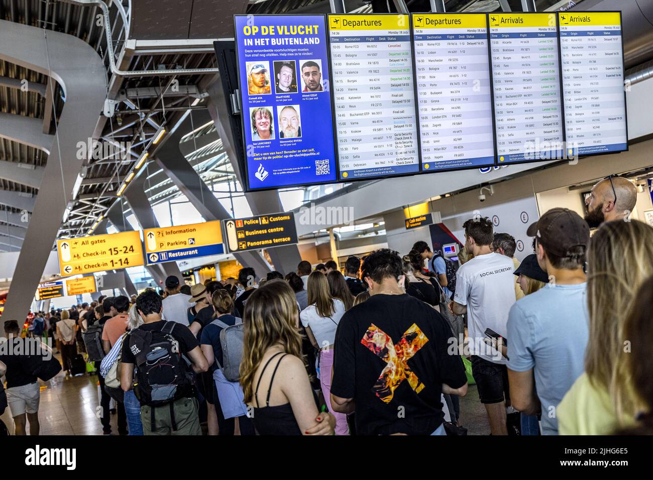 2022-07-18 15:27:22 EINDHOVEN - A search message on a departure times screen in the terminal of Eindhoven Airport. Travelers are shown photos of eight fugitive convicts in the departure halls of Schiphol, Eindhoven Airport and Rotterdam The Hague Airport. ANP ROB ENGELAAR netherlands out - belgium out Stock Photo