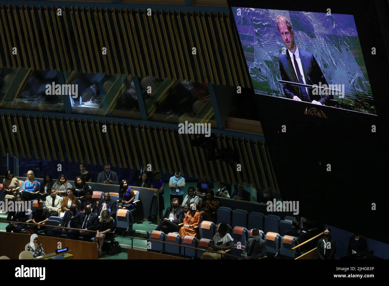 Britain's Prince Harry is seen on a screen as he addresses the United Nations General Assembly to celebrate Nelson Mandela International Day at the United Nations Headquarters in New York, U.S., July 18, 2022. REUTERS/Shannon Stapleton Stock Photo