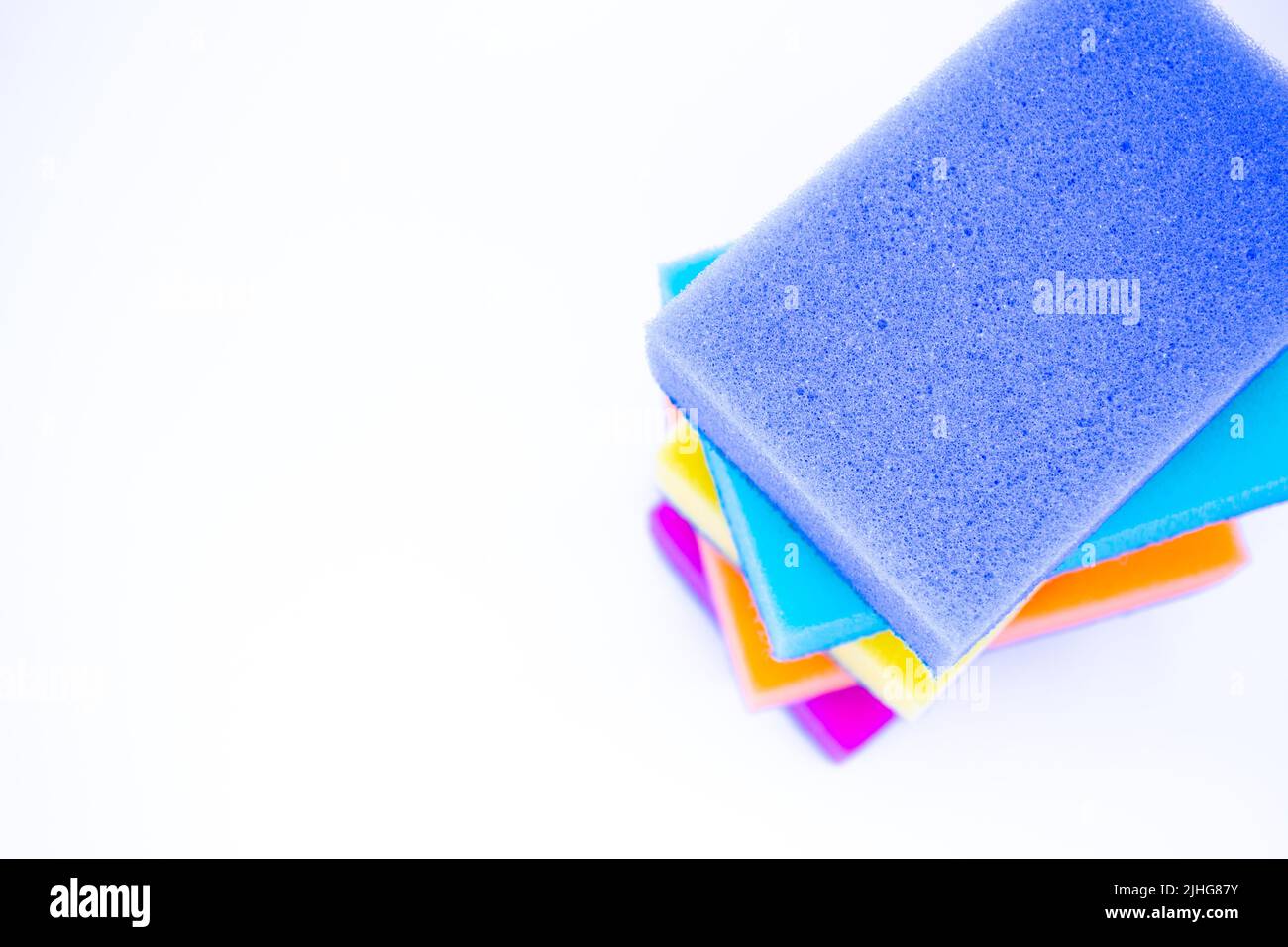 Yellow Sponges For Washing Utensils On A White Background Stock