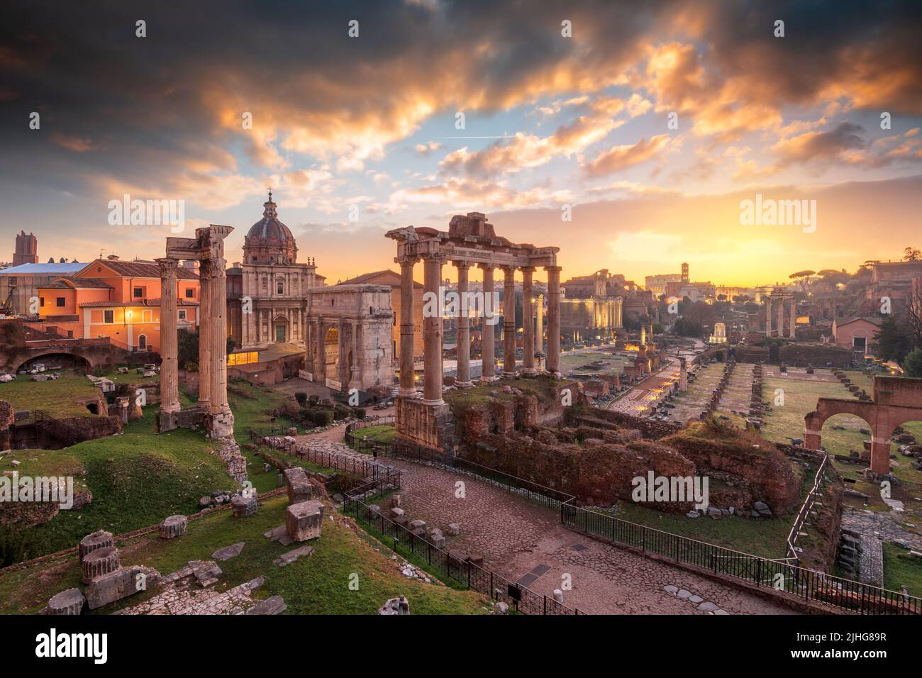 Rome, Italy at the historic Roman Forum ruins at dusk. Stock Photo