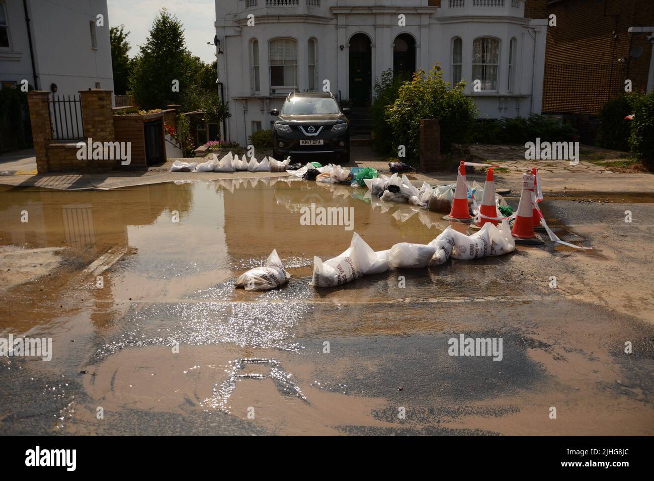 Hot weather causes a major road in Kingston upon Thames to crack and