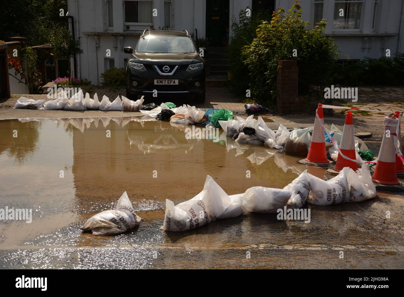 Hot weather causes a major road in Kingston upon Thames to crack and