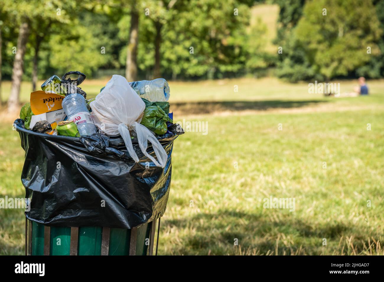 London, UK July 2020 Overflowing large rubbish and litter garbage