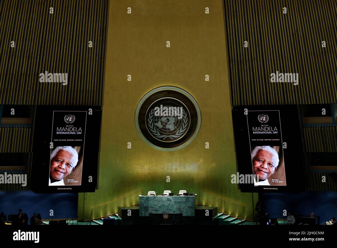 An image of Nelson Mandela appears on screens at the United Nations General Assembly celebration of Nelson Mandela International Day at the United Nations Headquarters in New York, U.S., July 18, 2022. REUTERS/Eduardo Munoz Stock Photo