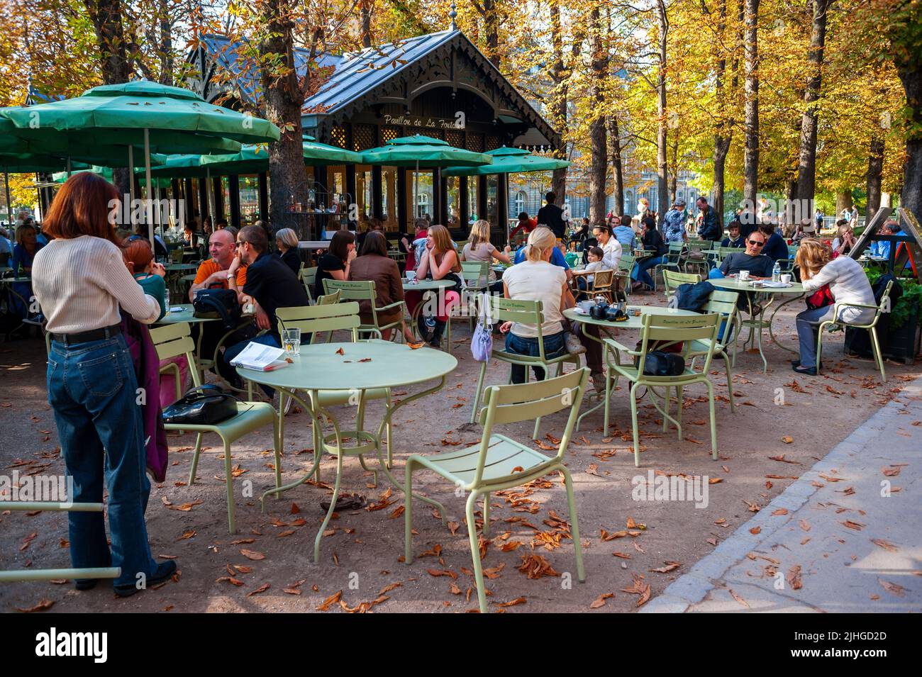 Paris, France, Crowd People, Sitting at Tables, French Cafe Terrace in Public Park, in Autumn, 'Pavillion de la Fontaine' Luxembourg Gardens Stock Photo