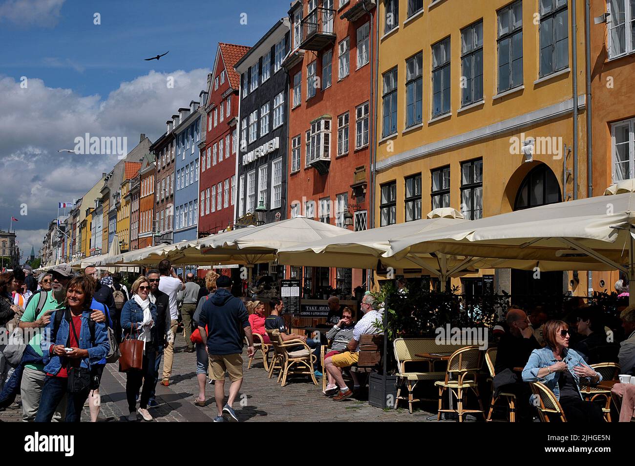 Copenhagen /Denmark./ 09 June 2019/ Tourists life at Nyhavn Canal cafe and restaurants and walk touring on Nyhavh canal .. (Photo..Francis Dean / Deanpictures. Stock Photo