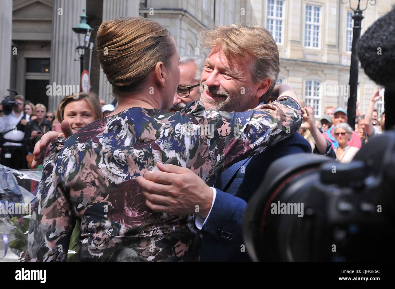 Copenhagen /Denmark./ 27June 2019/ Denmark's new prime minister social democrat kisses and hugs her boy friend Bo Tengberg after meeting with queen at infron the Amalienborg palace in danish capital, Mette Frederiksen is single mother wih two teen children, PM is 42years old female and 24 years she came in danish parliament as social democrat and  she has held weveral minter post in past social democrat got. Mette Frederisksen greets her boy friends with hugs and kiss. . (Photo..Francis Dean / Deanpictures. Stock Photo